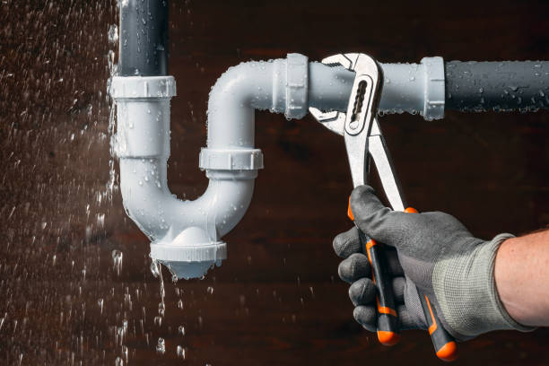 Professional Drain Cleaning technician working in Manchester, NH